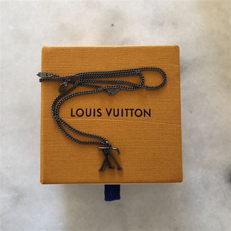 louis vuitton upside down necklace replica|louis vuitton fake.